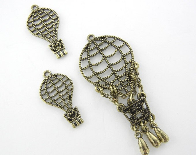 Set of Antique or Burnished Gold-tone Filigree Hot Air Balloon Pendant and Charms
