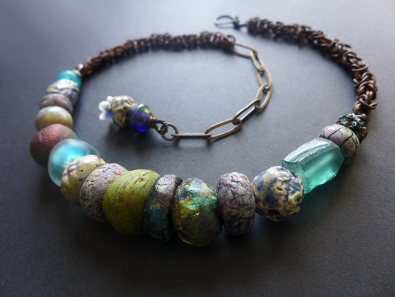 Gigil. Thick and chunky rustic assemblage choker with textured art beads.