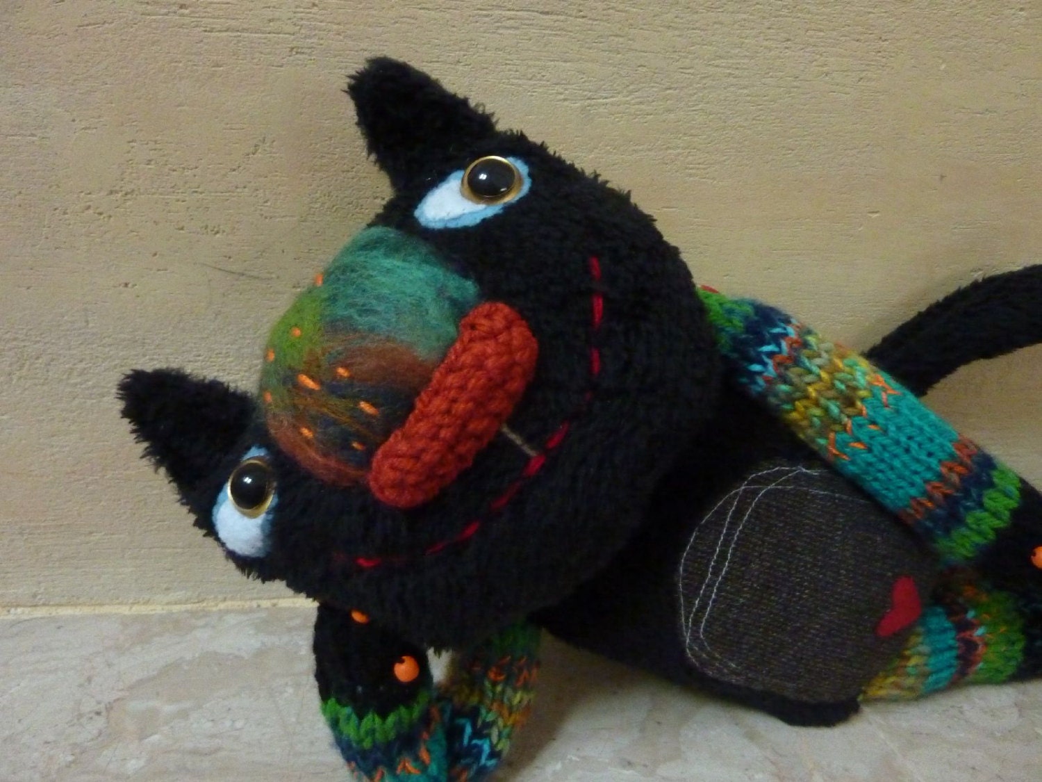 black stuffed cat toy