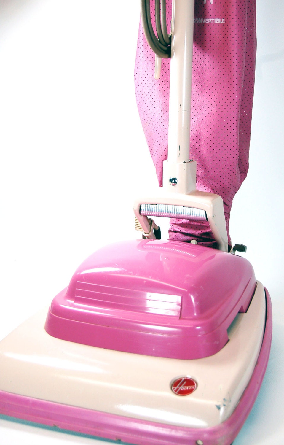 pink toy vacuum