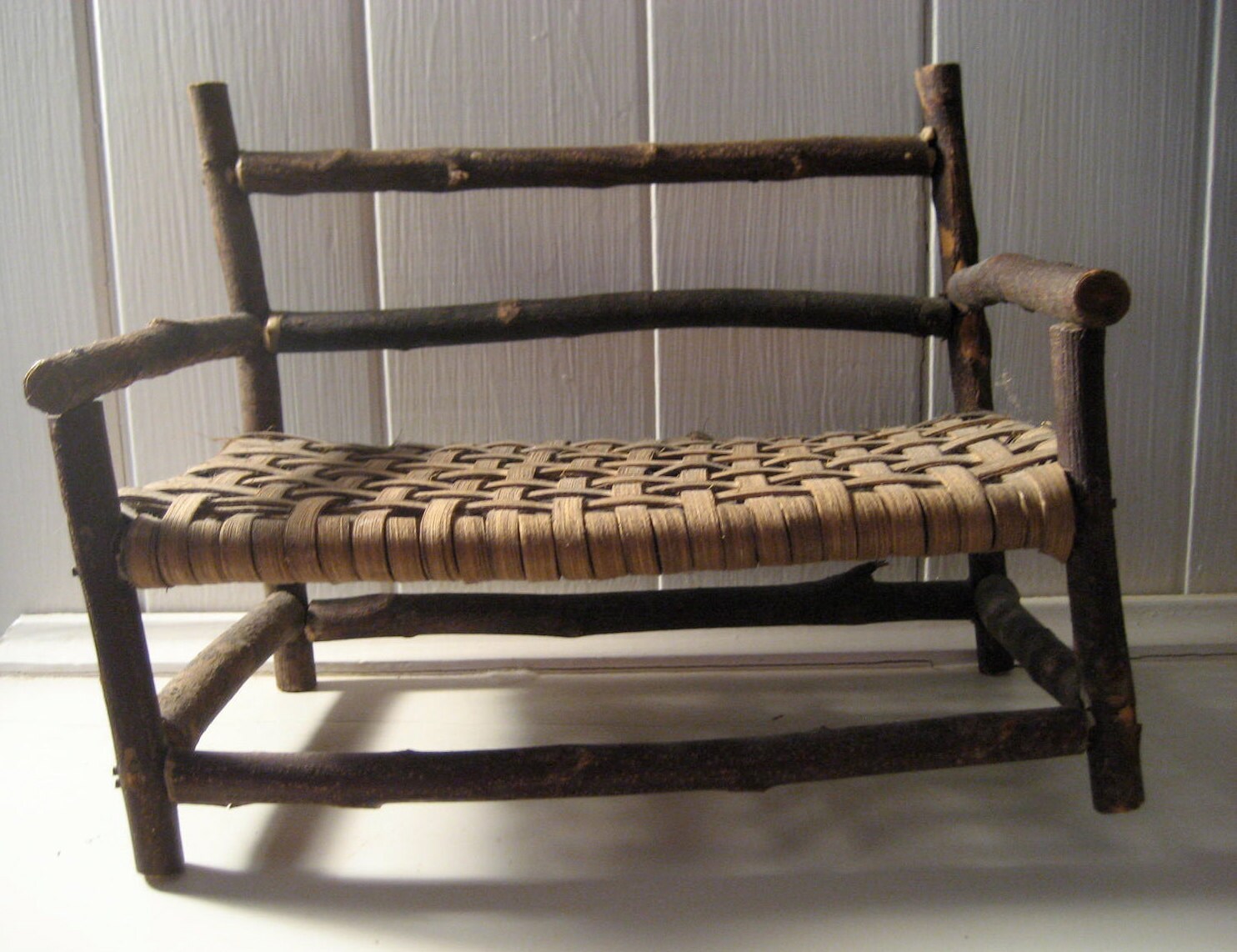 miniature handmade twig bench with woven seat Haute Juice