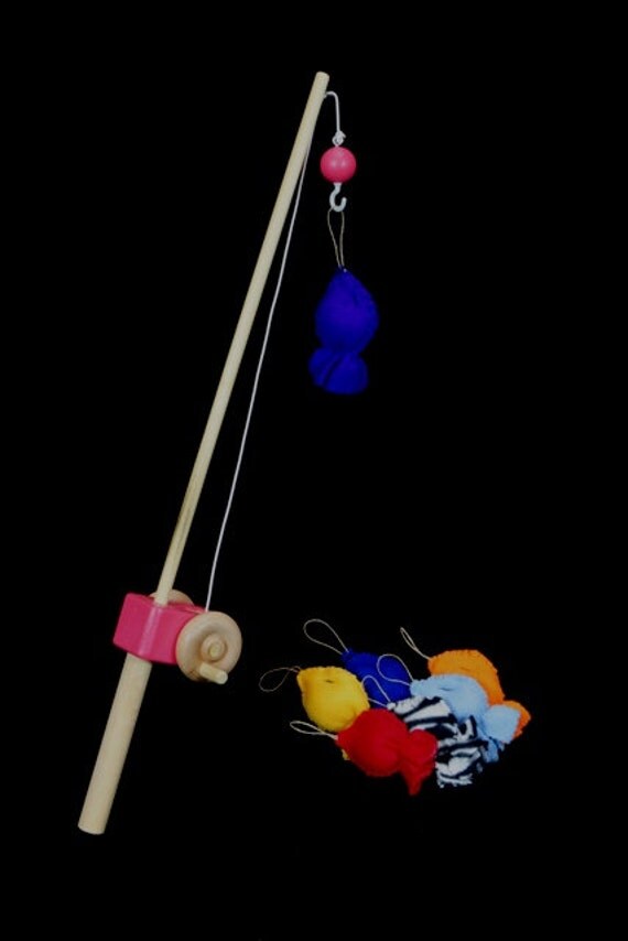 Pink Fishing Pole With Fabric Fish And A Hook