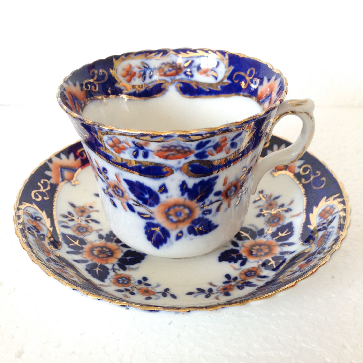 Antique Tea cup and saucer set Blue and Orange Gold Flowers