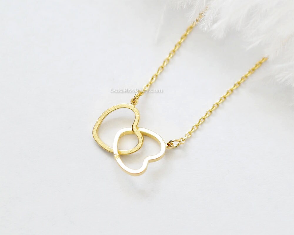 Two hearts necklace in gold Double hearts necklace gold