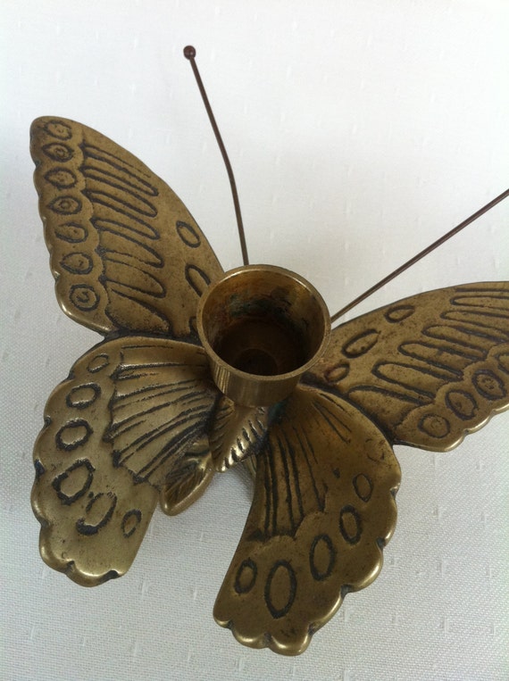 A Brass Butterfly Candle Holder