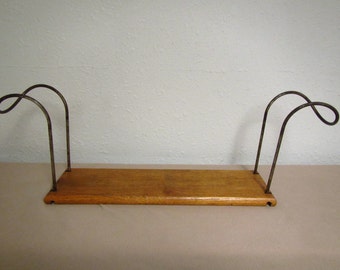 Antique Barber chair OAK BOOSTER SEAT. Oak seat with metal hooks that fit over chair arms or hooks reversed rest on chair seat