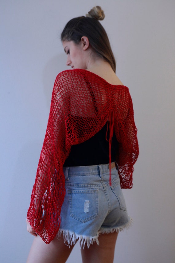 red woolen shrug