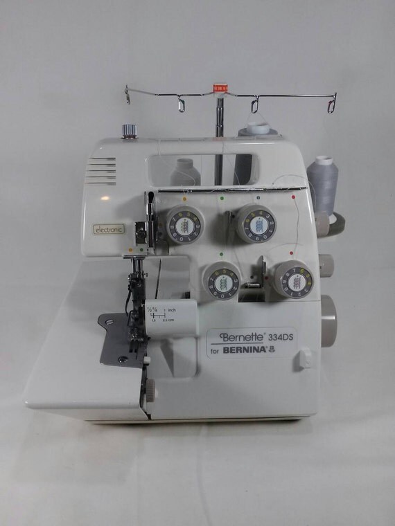 334D bernina surger sewing machine with case and