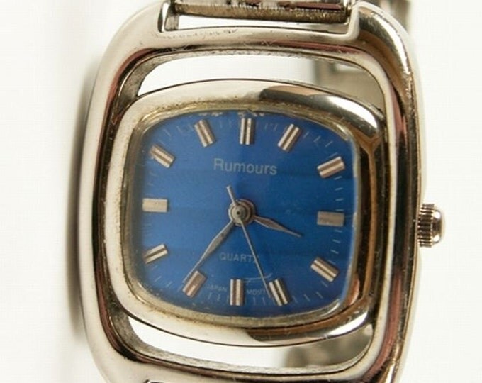 Storewide 25% Off SALE Vintage Ladies Rumours Quartz Silver Tone Watch Featuring Cobalt Blue Dial With Open Bracelet Style Band