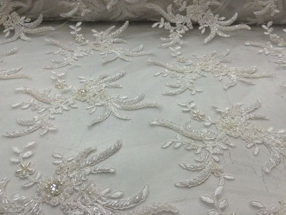 Ivory Flowers Embroider And Hand Beaded On A by KINGDOMOFFABRICS