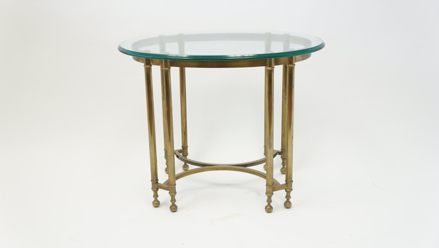 Modern Art Deco Heavy Brass Oval Thick Glass Top Double Leg Curved Base