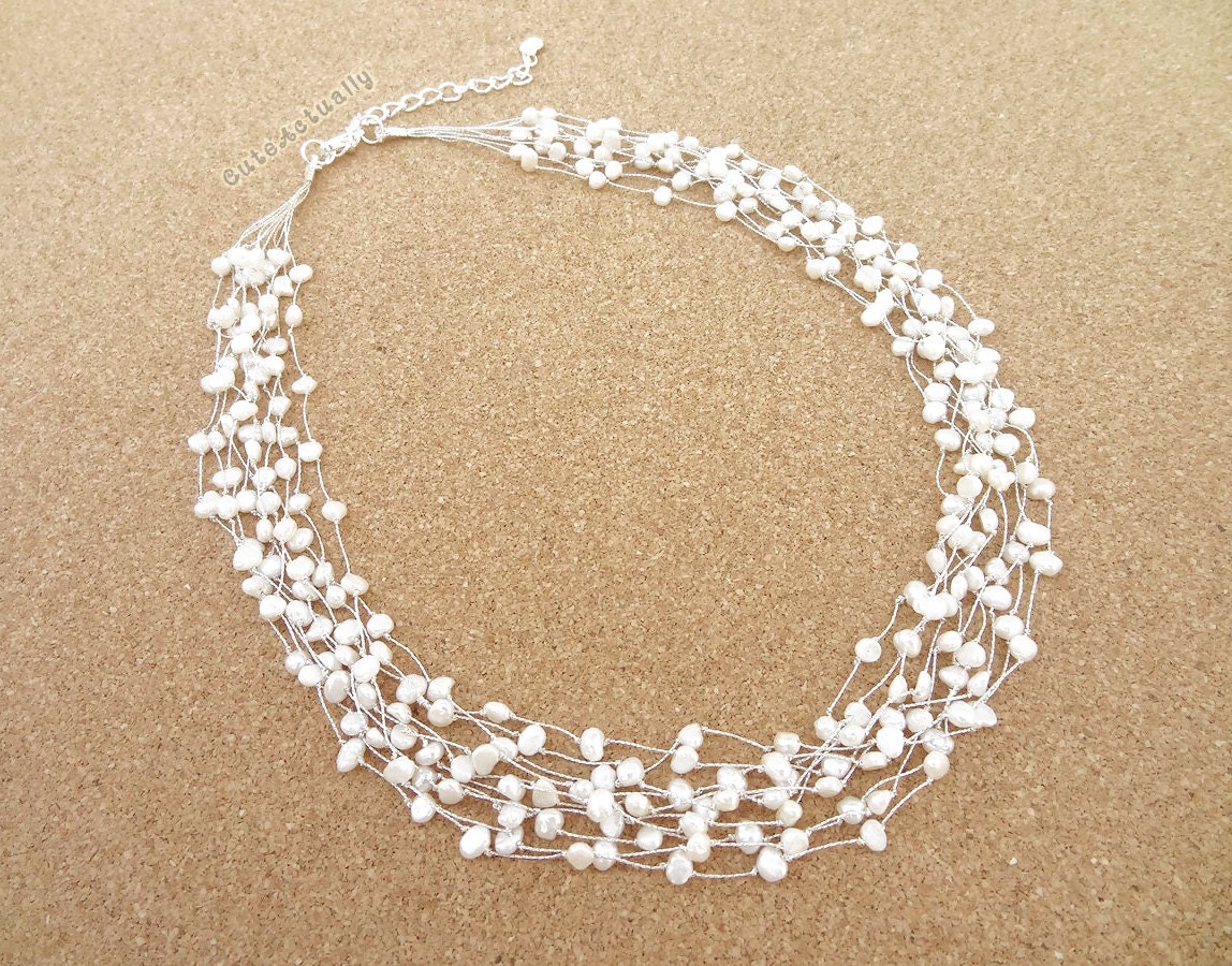 White freshwater pearl necklace on silk thread Bridal