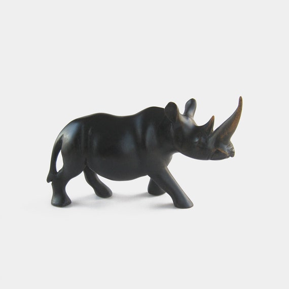 wooden rhino statue