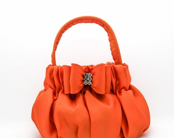 pink and orange handbag