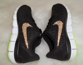 womens nike black with gold swoosh