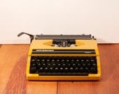 Vintage yellow Sperry Remington Tenfifty typewriter Vintage yellow Sperry Remington Tenfifty typewriter