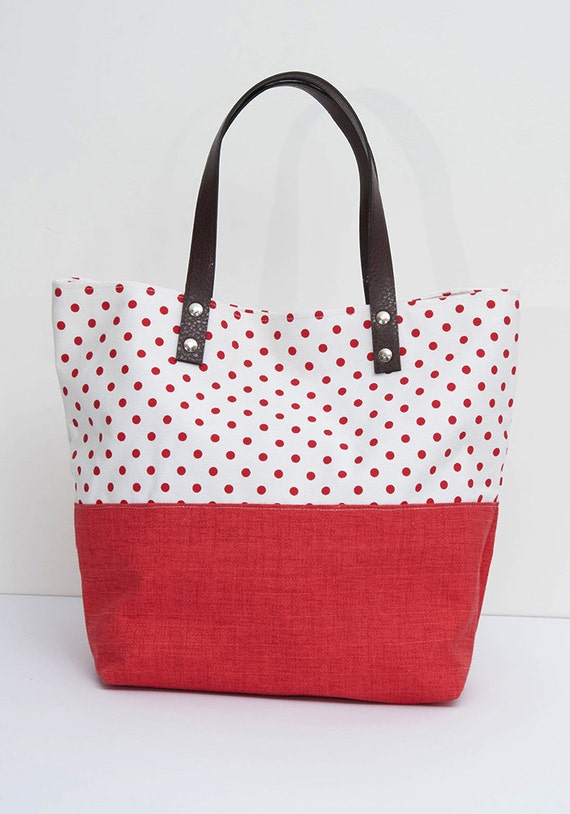 red polka dot bag