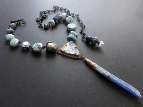Cyaneous. Bright blue white rustic assemblage necklace with long rough kyanite pendant, beach pottery, art beads.