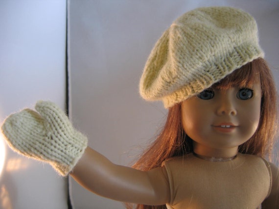 knitted beanie doll with mittens