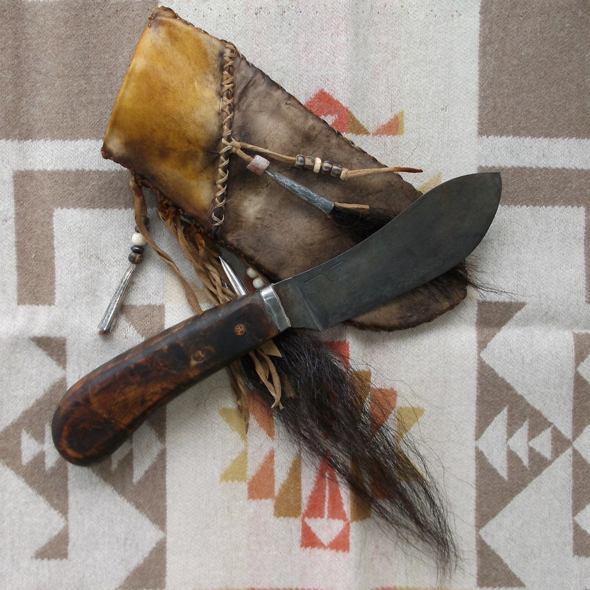 Primitive Nessmuk Mountain Man Knife in Decorated Rawhide
