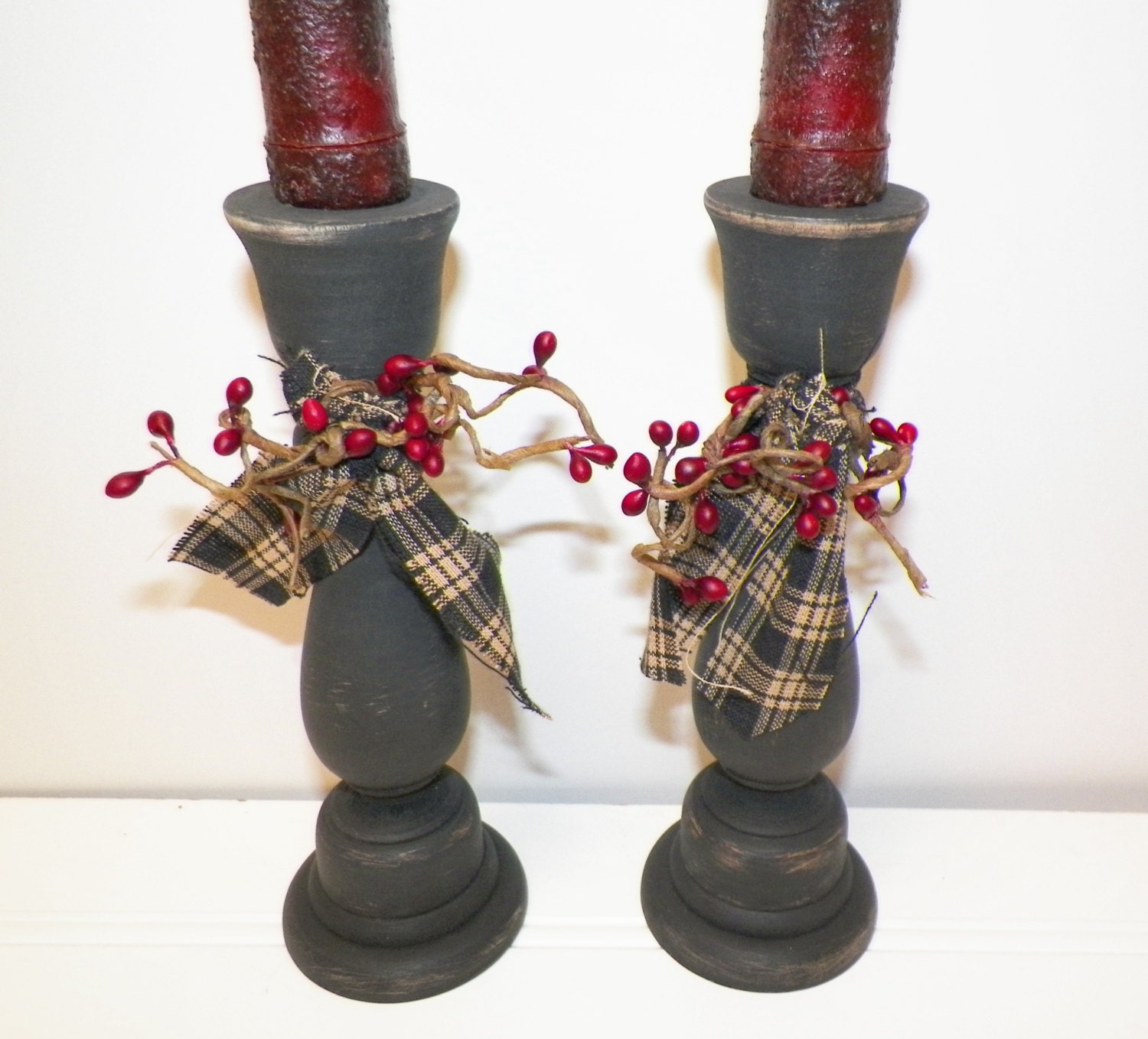 primitive rustic candle holders        
        <figure class=