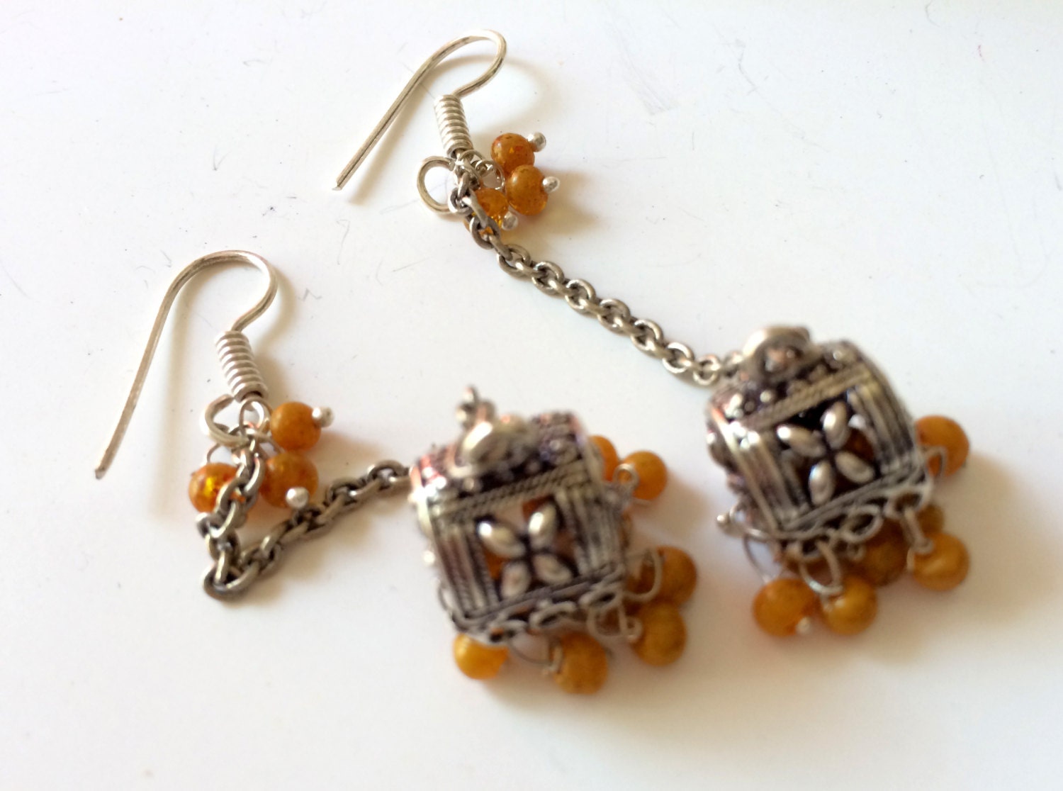 silver butta earrings