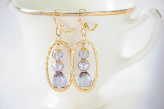 https://www.etsy.com/listing/230635509/purple-gold-dangle-earrings-pastel?ref=shop_home_active_22