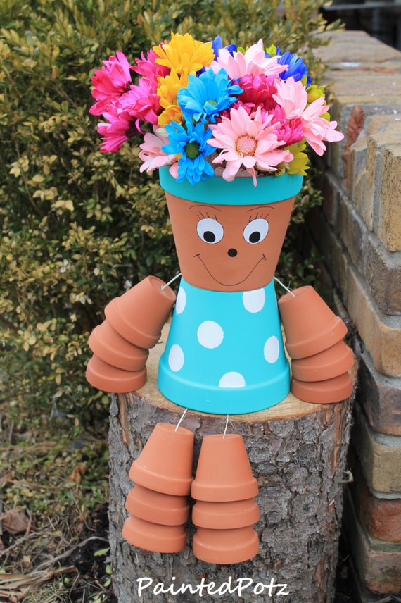 Items similar to Blue painted flower pot person  on Etsy