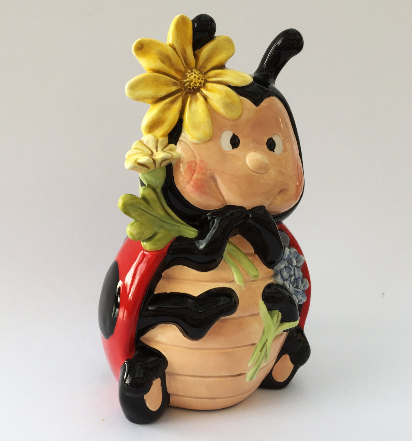 ladybug ceramic figurine