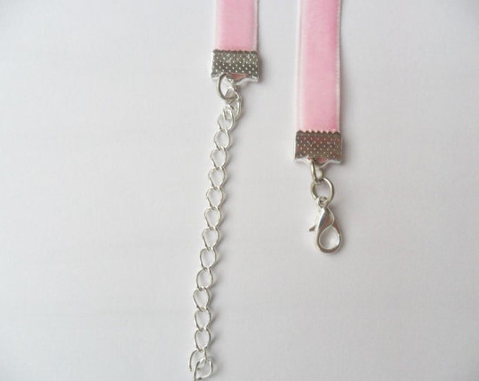 Pink velvet choker necklace with moon pendant and a width of 3/8"inch.