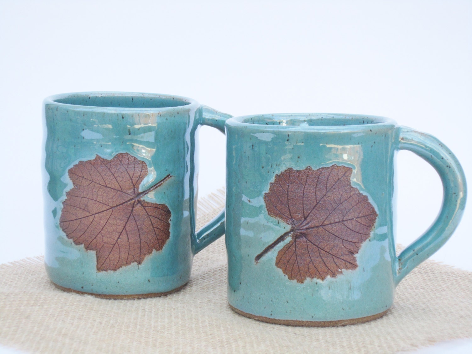 Set of Pottery mug with Leaf embelishment