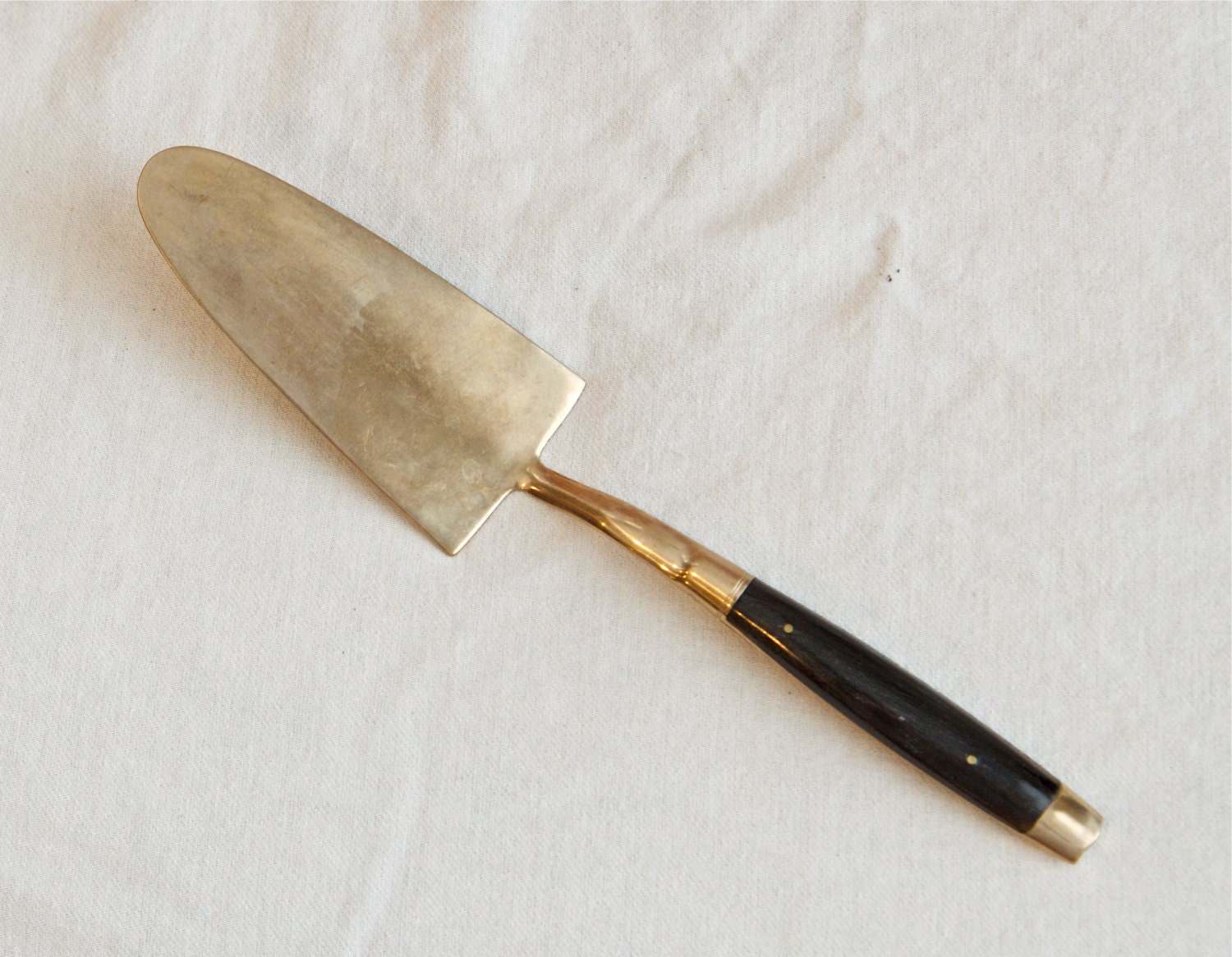 Vintage bronze pie or cake server. Haute Juice