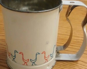 Mid century flour sifter. Androck made in USA.