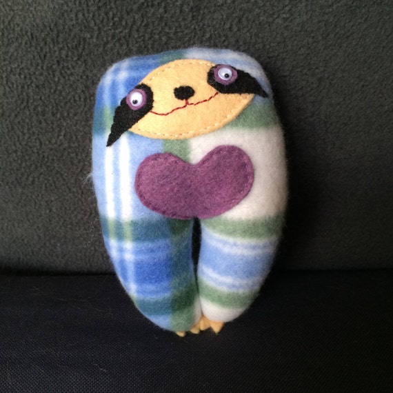 sloth with heart stuffed animal