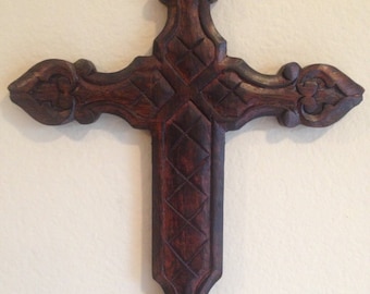 A Dark Wooden Cross.