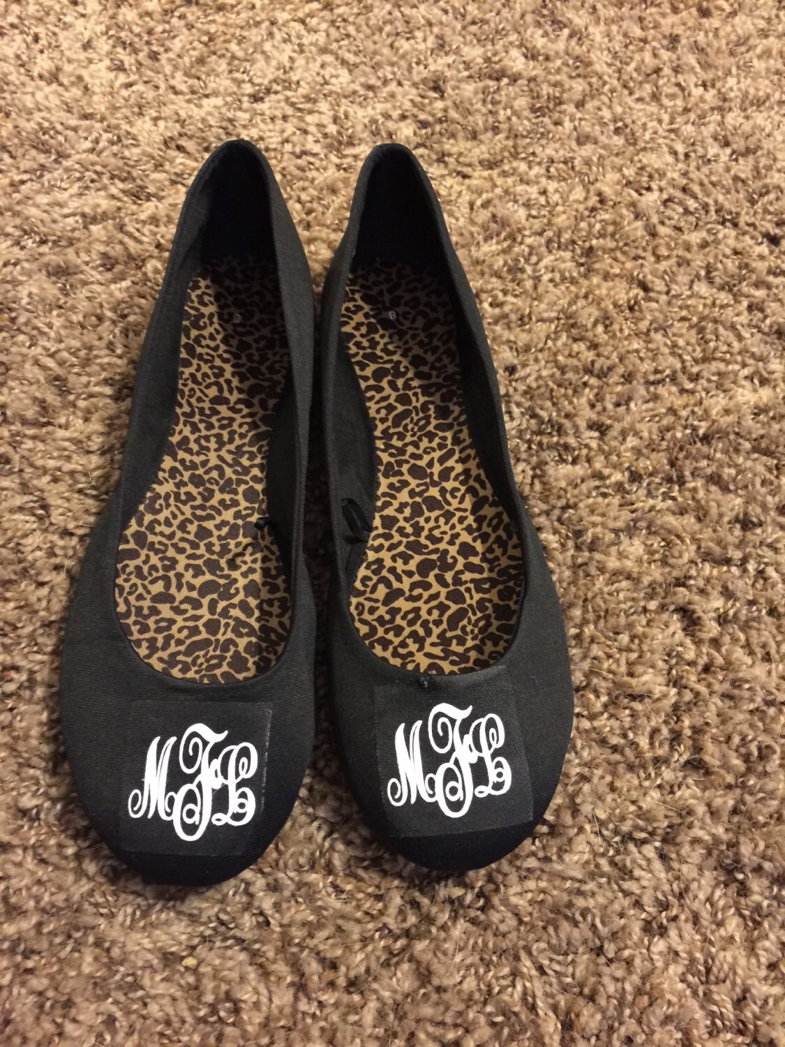 black heels with pearls on them