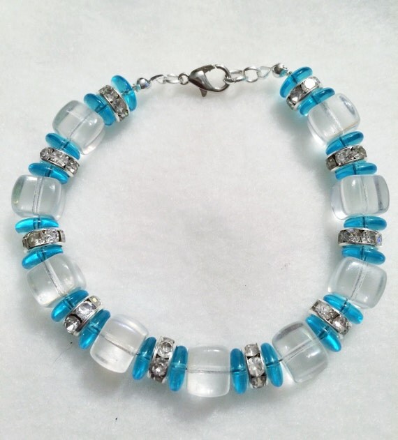 Items similar to Blue and clear beaded bracelet on Etsy