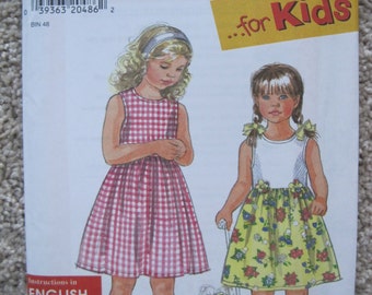 UNCUT Girls Dress - Size 2 to 6X - Simplicity Sewing Pattern 7710