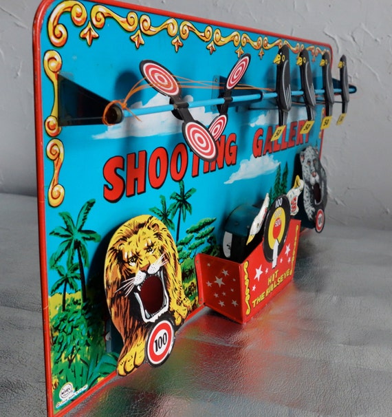 Items similar to Marx Toys Wind Up Tin Litho Shooting Gallery Toy Guns Target 1960s Bullseye