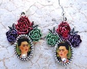 Frida Kahlo 3 Rose Earrings. Feminine and sublime. Portrait by artist, frame is hand painted by me. Crystal dot at neckline. Frida Kahlo 3 Rose Earrings. Feminine and sublime. Portrait by artist, frame is hand painted by me. Crystal dot at neckline.