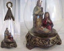 Vintage figurine of baby Jesus in manger, Mary and Joseph in glass ...