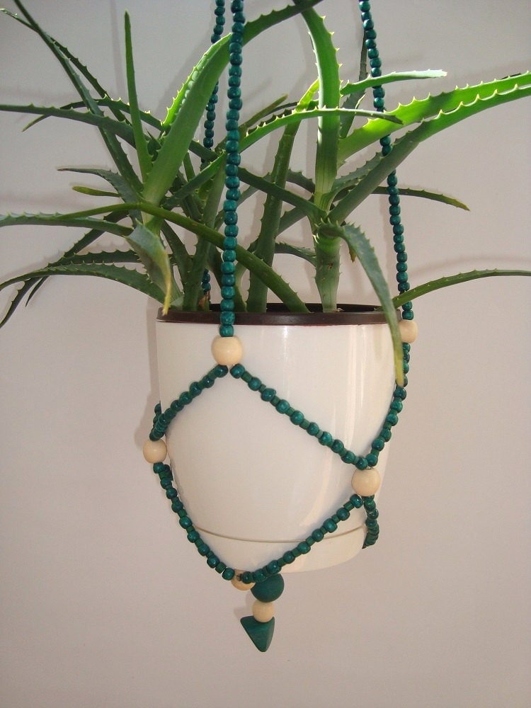 Beaded plant hanger. Planter