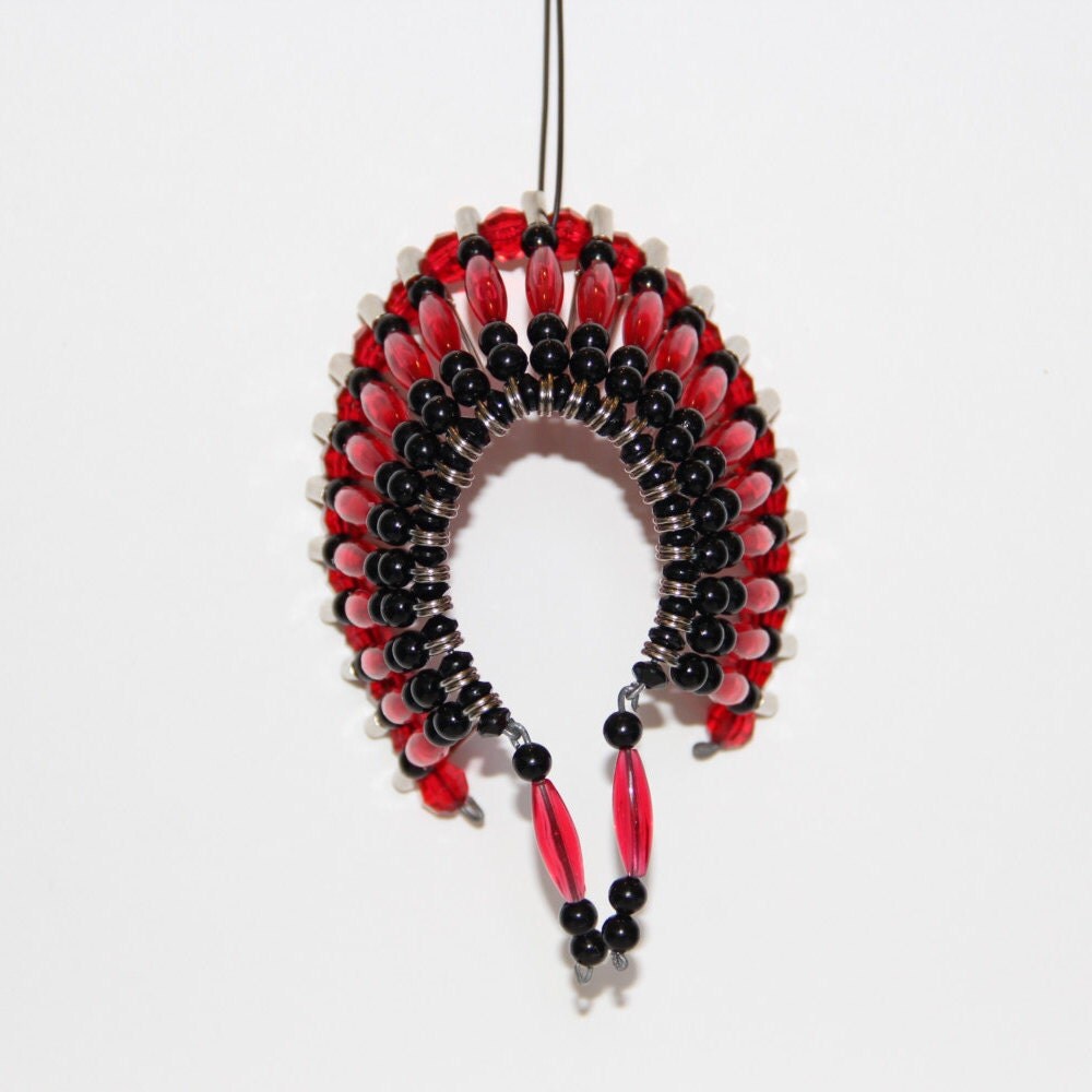 Beaded handmade headdress. It is made with by HayesDayPhotography