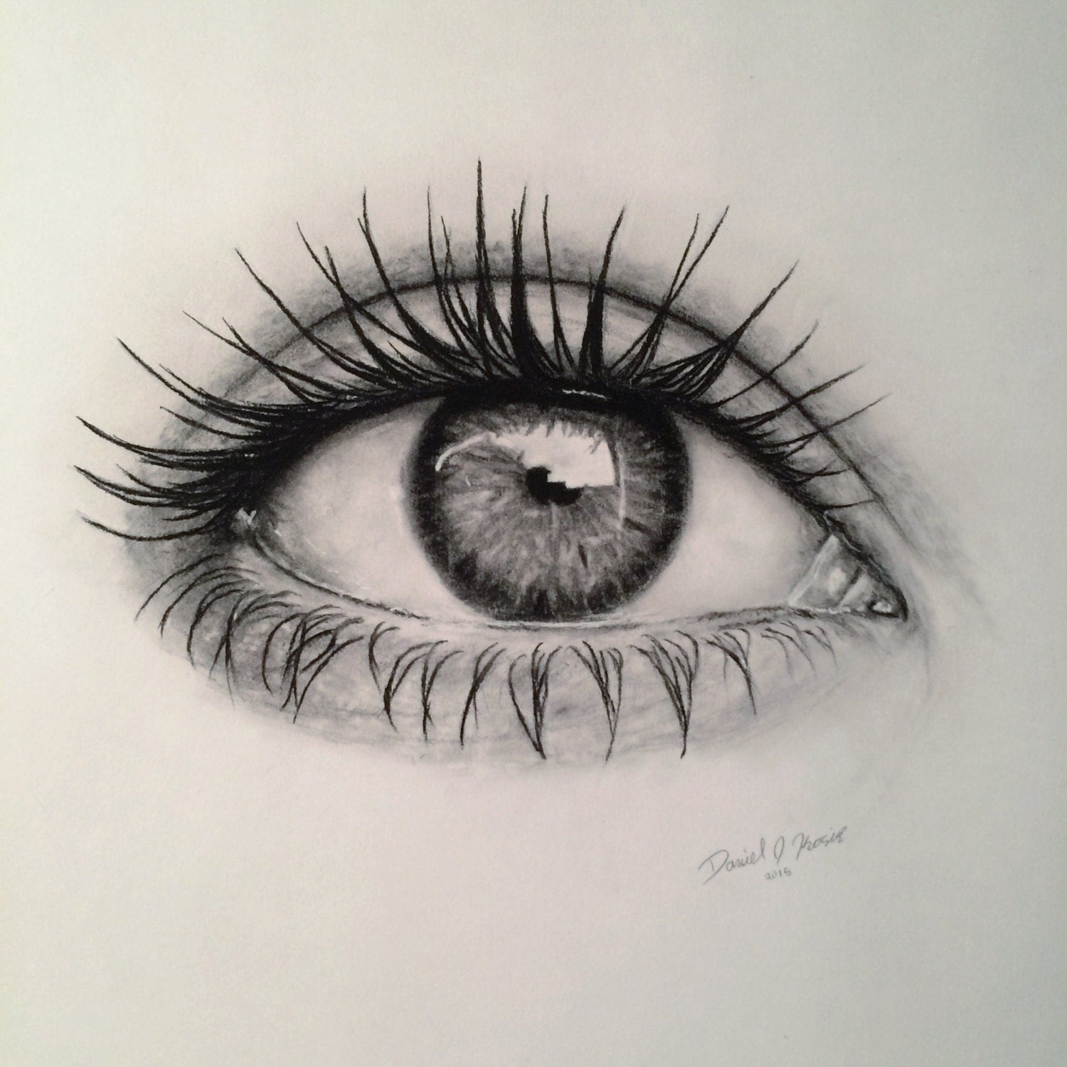 Realistic charcoal and graphite eye drawing by DanielKosior