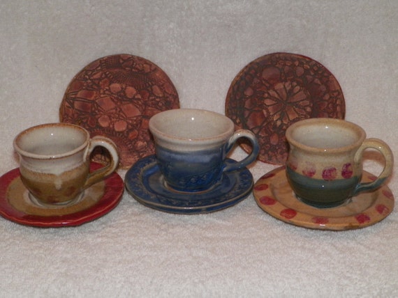 miniature porcelain tea cups and saucers