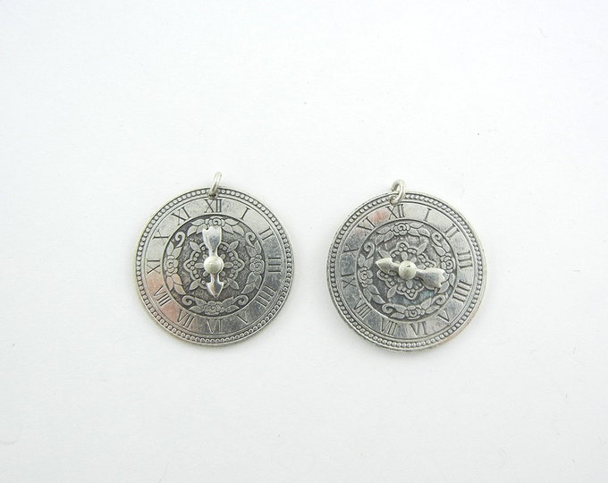 Pair of Round Clock Charms with Roman Numerals and Moving Hands