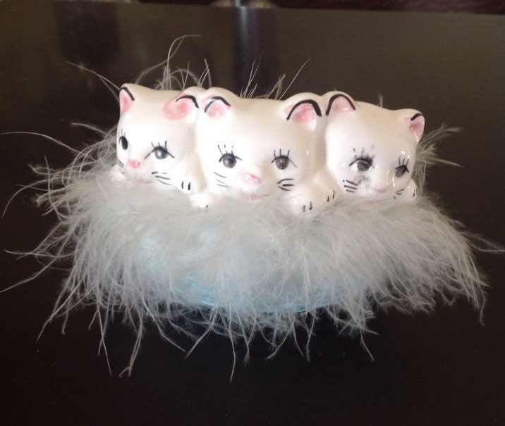 stuffed kittens in a basket