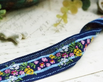 2 yards of blue bottom with small flower lace ribbon