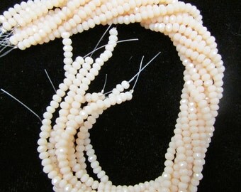 Beige 1.5x2.5mm Chinese Crystal Rondelles (4p)