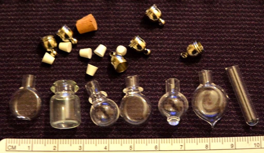 7 Pcs miniature mini vials with caps. Witch potion vials ideal for dolls house project or mini jewellery steampunk. test tube etc